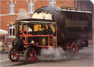 Foden steam wagon 'Britannia' on commercial duty advertising a beer company.